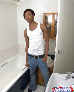Ebony boy wacks off in the bath tub